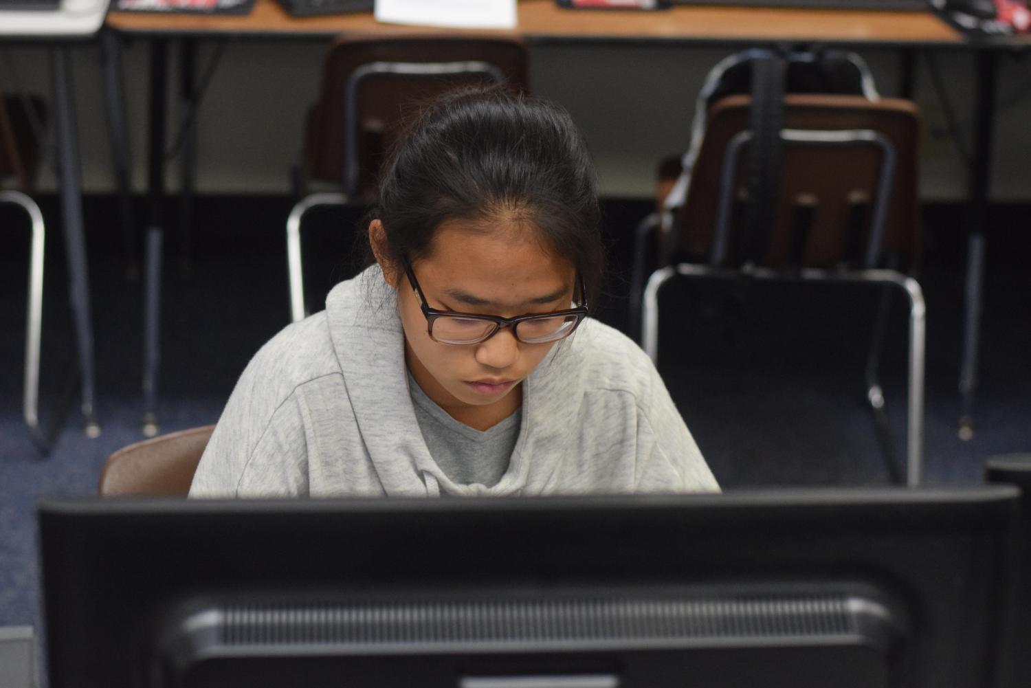 Sami Qian (9) logs onto her account for the class, where she can view assignments and lessons from wherever she has a computer.