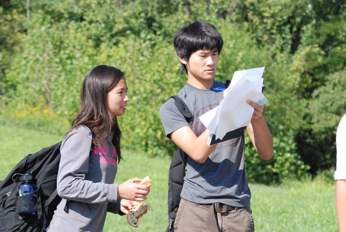 Juniors Melinda Lai and Liyang Gu spend Ac Lab outside during a Bonus Knowledge session for English teacher Sean Rochesters Honors American Literature Class. Photo by Clare Conlisk.