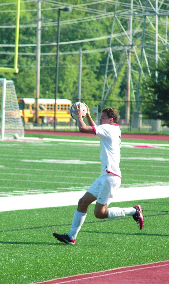Junior Nick Helmbacher throws the ball in during a home game on Sept. 30th.  