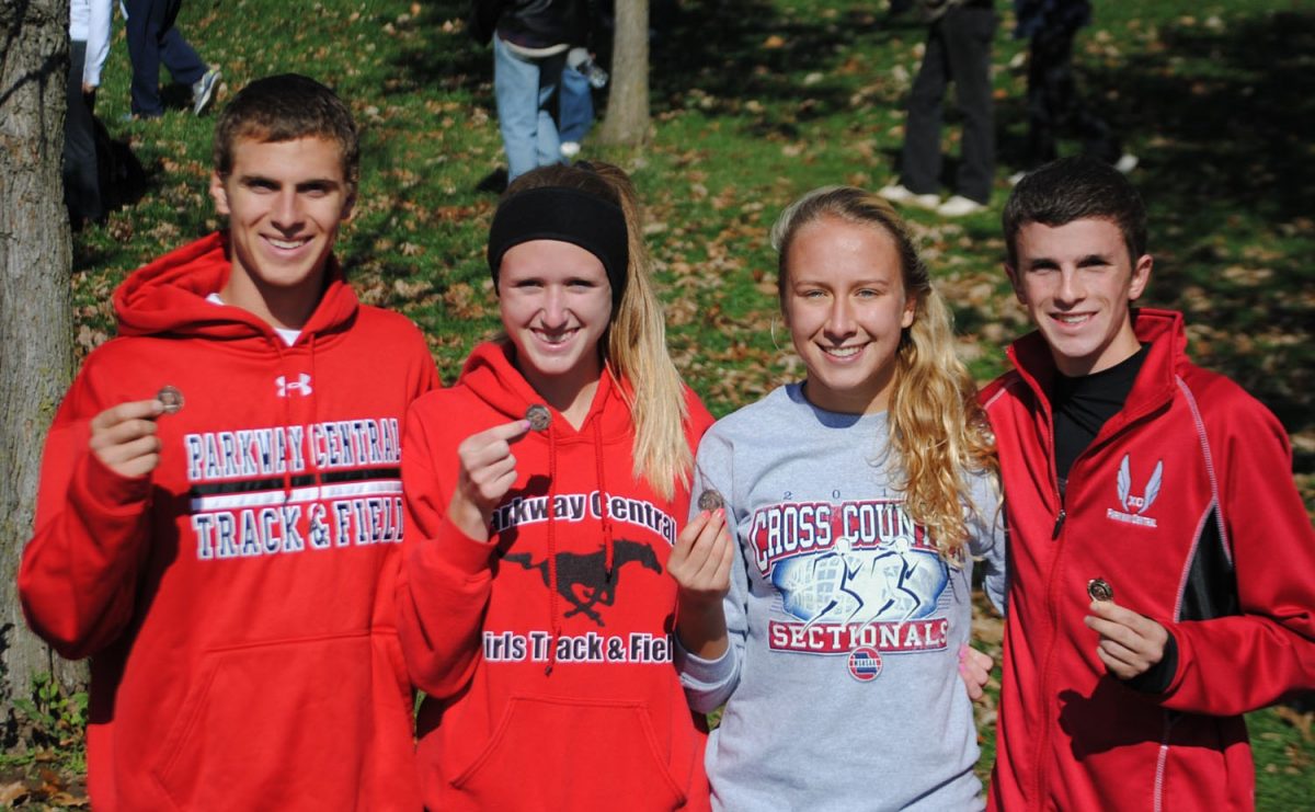 Brian Krumrey, Kayla Friesen, Allison Bain and Scott Coulson qualified for the state cross country meet. Photo by Julia Goldman.