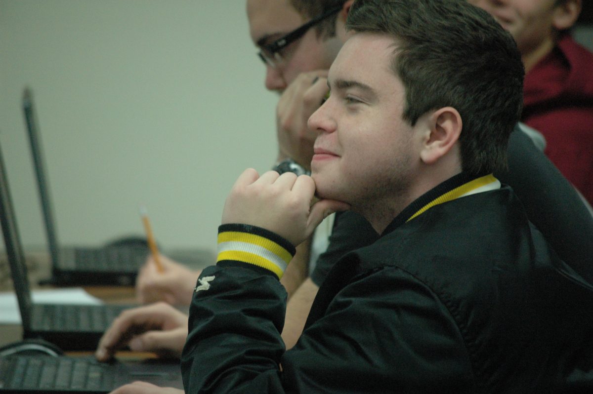Senior Connor Sosnoff contemplates what to put in his essay during Mr. Schaeffers 5th Hour Composition Class. Photo by Jamie Lazaroff.