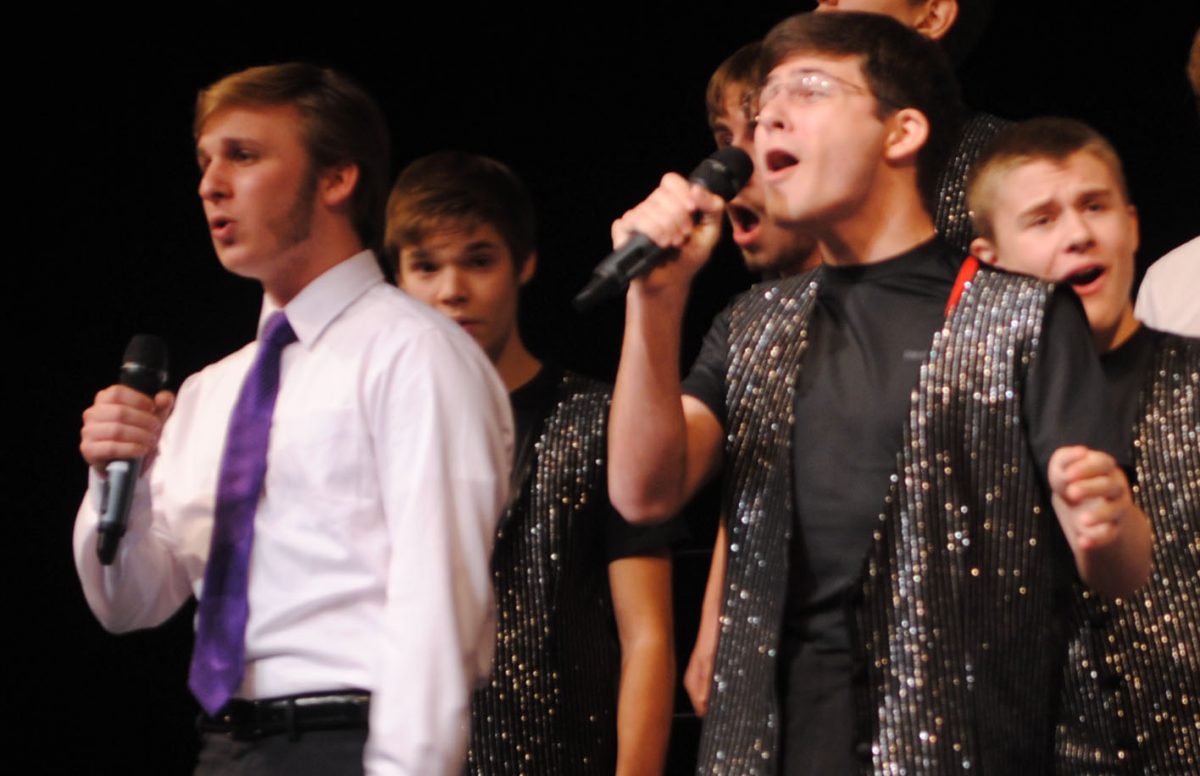 Juniors Jake Blonstein and Aidan McCarter sing during an On the Rocks performance. Photo by Kyla Gersten.
