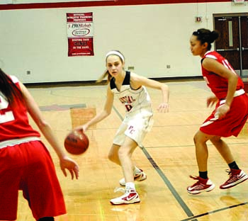 Freshman Shannon Flynn looks to make a move in the junior varsity game against Kirkwood on Jan 4.  Photo by Kyla Gersten.