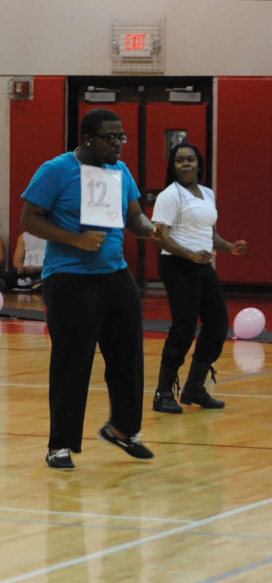 Senior Damund Huntley performs with some former High Stepper teammates during the Mr. PCH pageant. Photo by Ethan Morse.