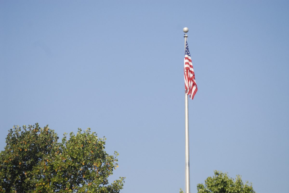 The American Flag outside of Parkway Central flies at full mass. Photo by Matt Stern