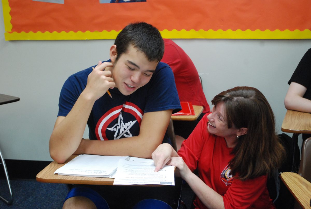 Dr. Susan King teaches senior Natsu Gavin in her AP history class. King has transitioned from teaching Honors World History to the Advanced Placement course. Photo by Kirk Randolph.
