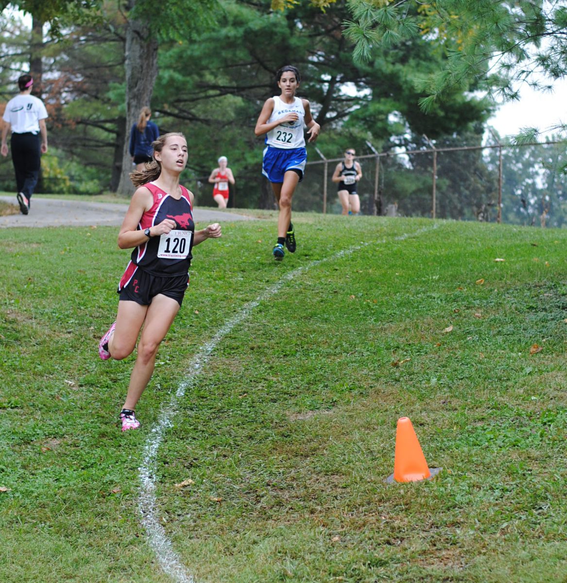 Sophomore Sarah Madsen competes in the conference meet at University City on Oct. 12. Photo by Ms. Tara Stepanek.