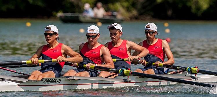 Senior Brandon Fenton (second from left) rows with his team of four on the St. Louis Rowing Club.  Fenton first started rowing four years ago.  Photo courtesy of Brandon Fenton