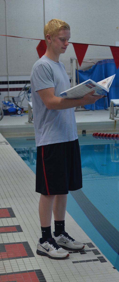 Senior Kirk Randolph swims and takes AP Statistics. Photo by Hanna Whitehouse.