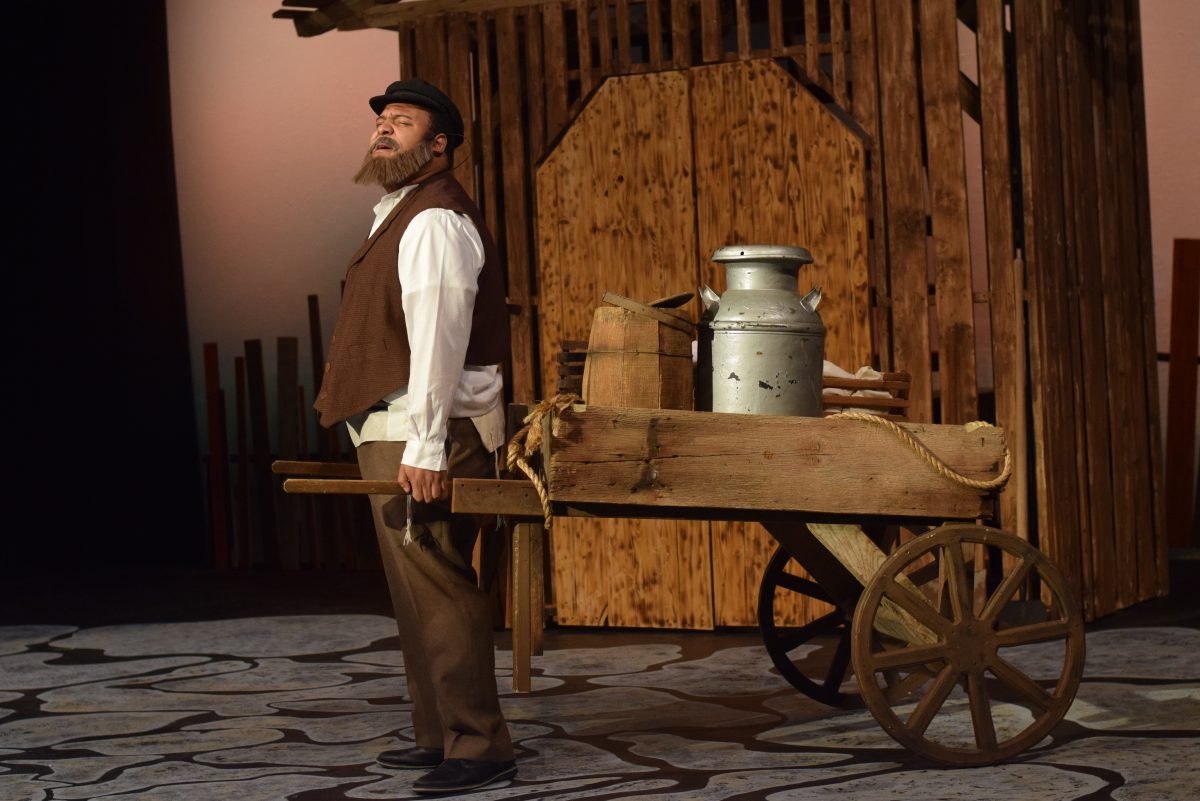 Senior Anthony Blatter plays the lead role of Tevye, the dairyman, as he contemplates life if he were rich. Photo by Evan Mogley