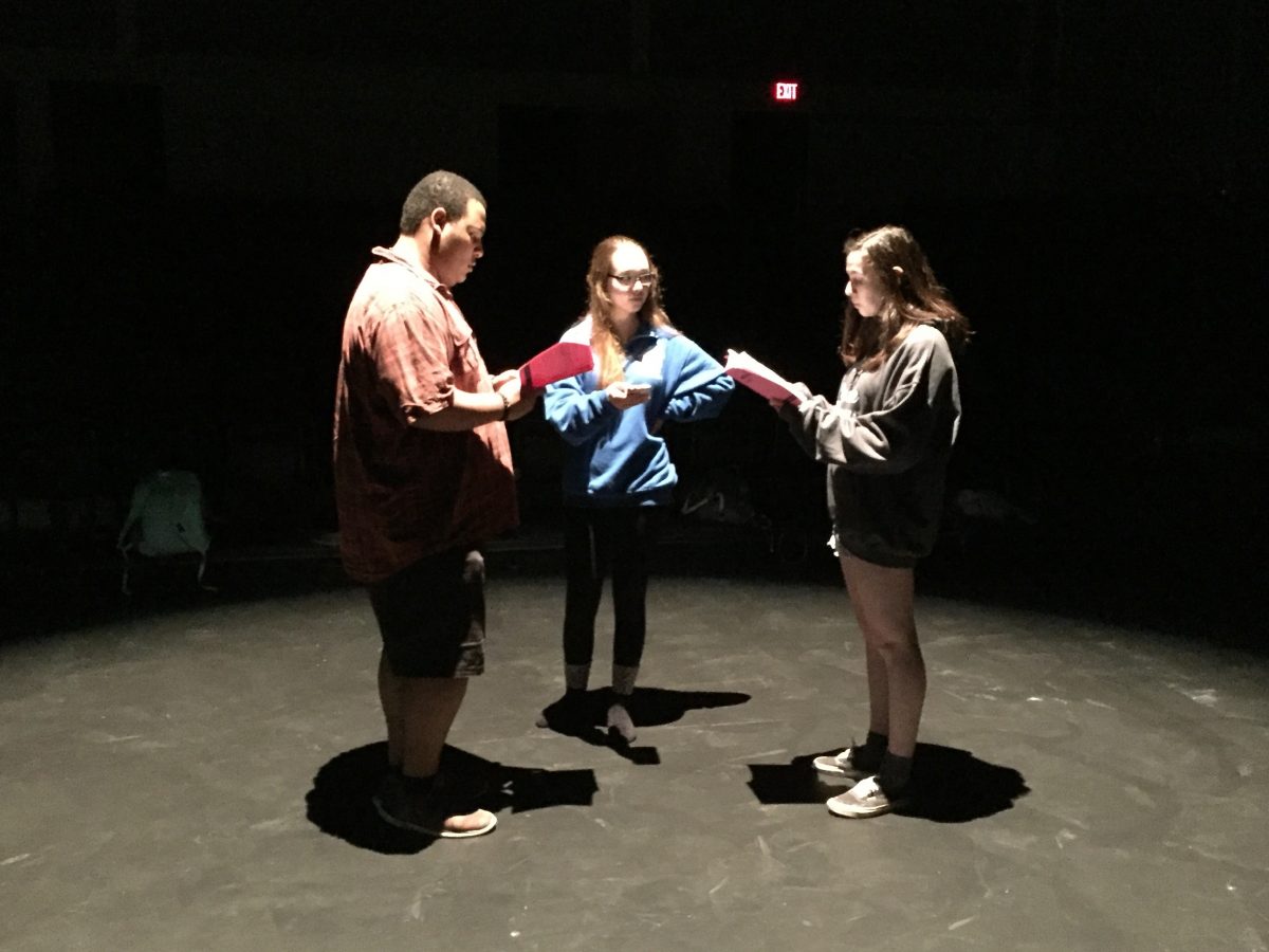 Senior Anthony Blatter and Junior Ariana Stein get directions from senior Emily Kang during “Mandy Dear” rehearsal.