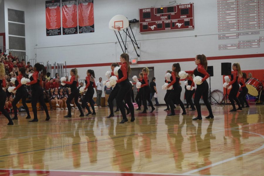 The Varsity Dance team performs at the Homecoming pep rally on Friday.