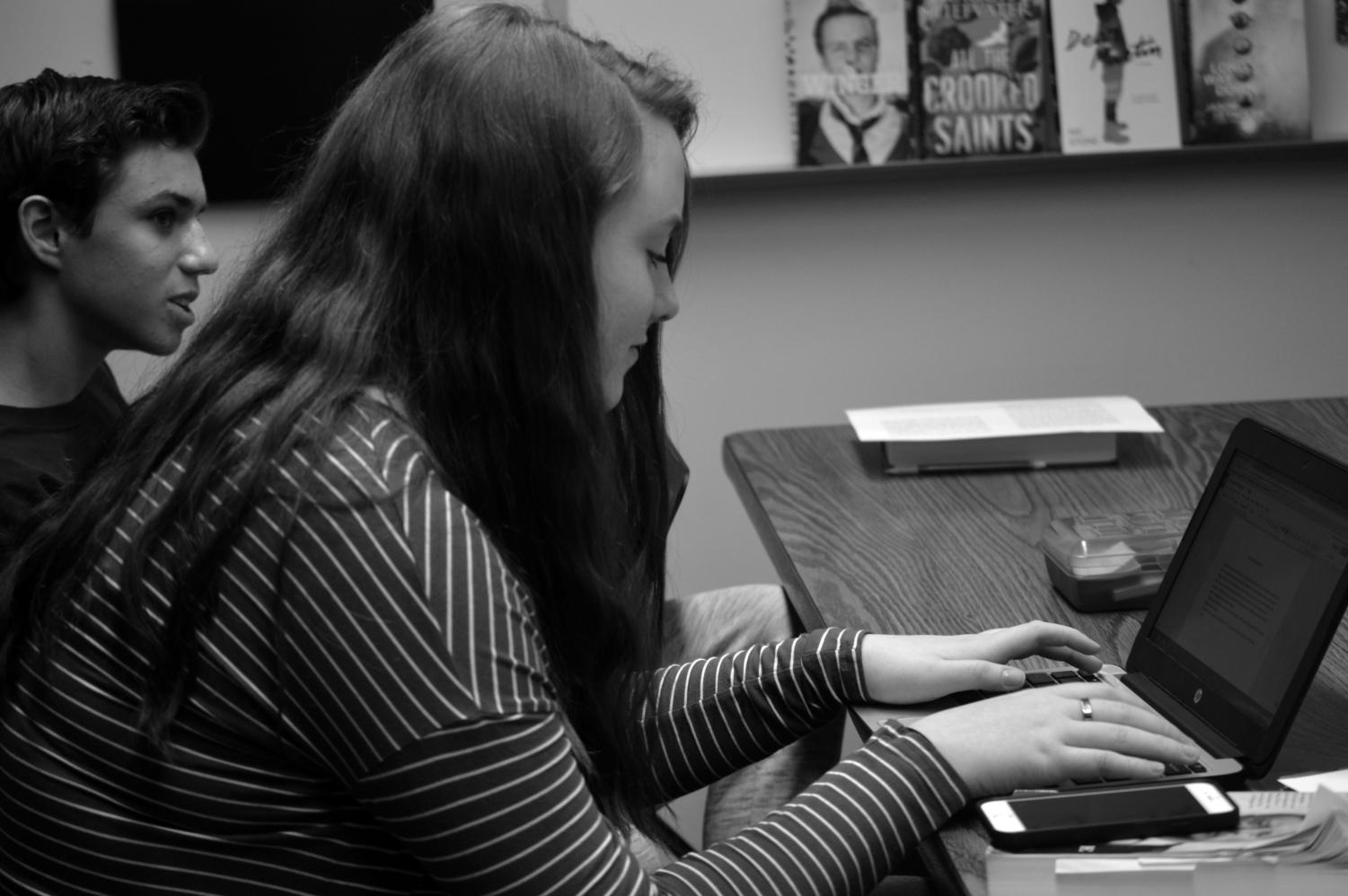 Freshman Amanda Becker starts her nightly English homework on Oct. 30 in Andrea Anderson’s classroom. Google Classroom is a way for students and teachers to communicate outside of school, but doesn’t affect the amount of homework we have.
