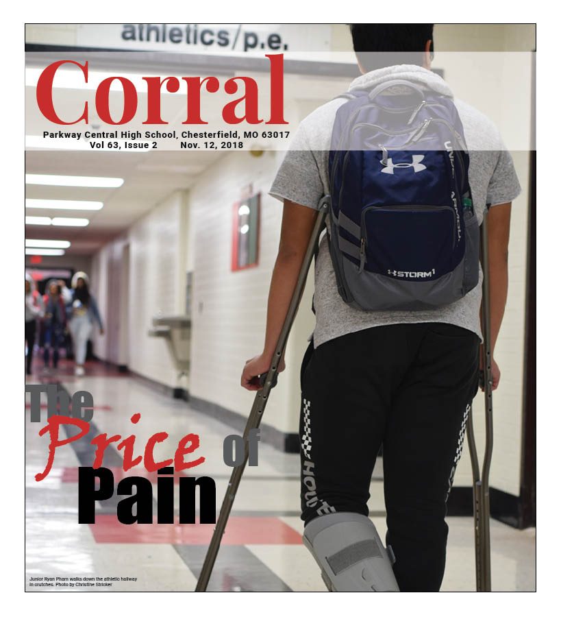 Junior Ryan Pham walks down the athletic hallway in crutches. 