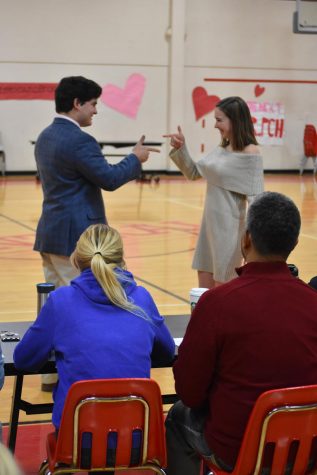 2018 Mr. PCH contestant Henry Eubank makes his entrance and does a handshake with then-senior Meghan Kane during the Mr. PCH Pageant.