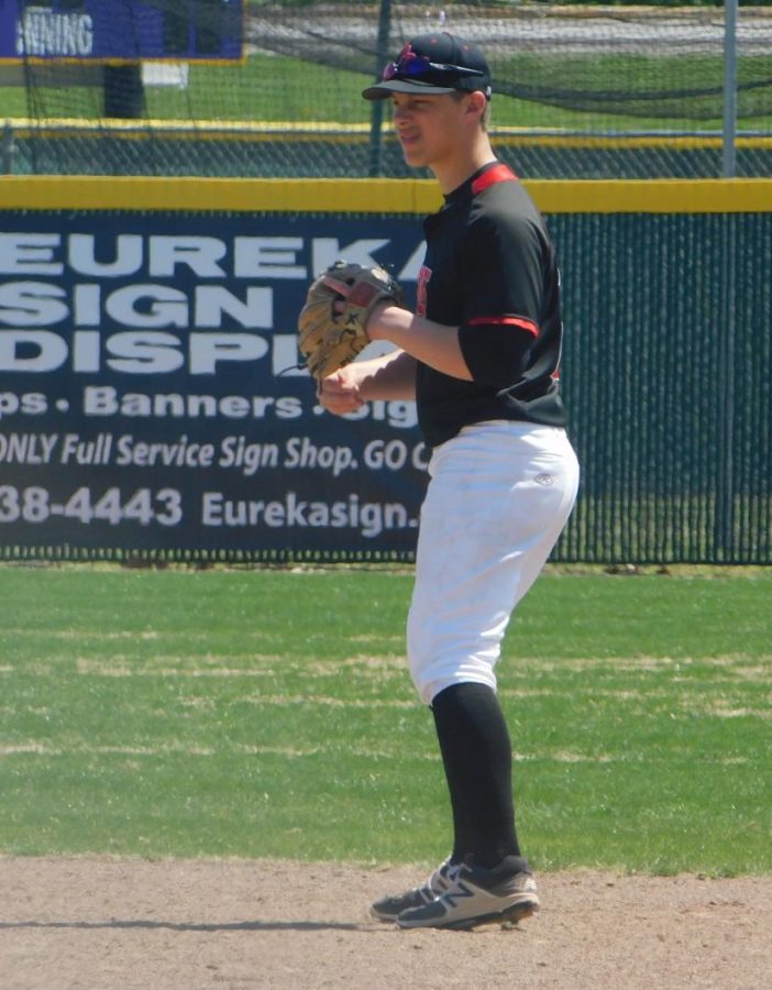 Current senior Sam Ladd takes his position at short stop in an away game at Eureka High. 