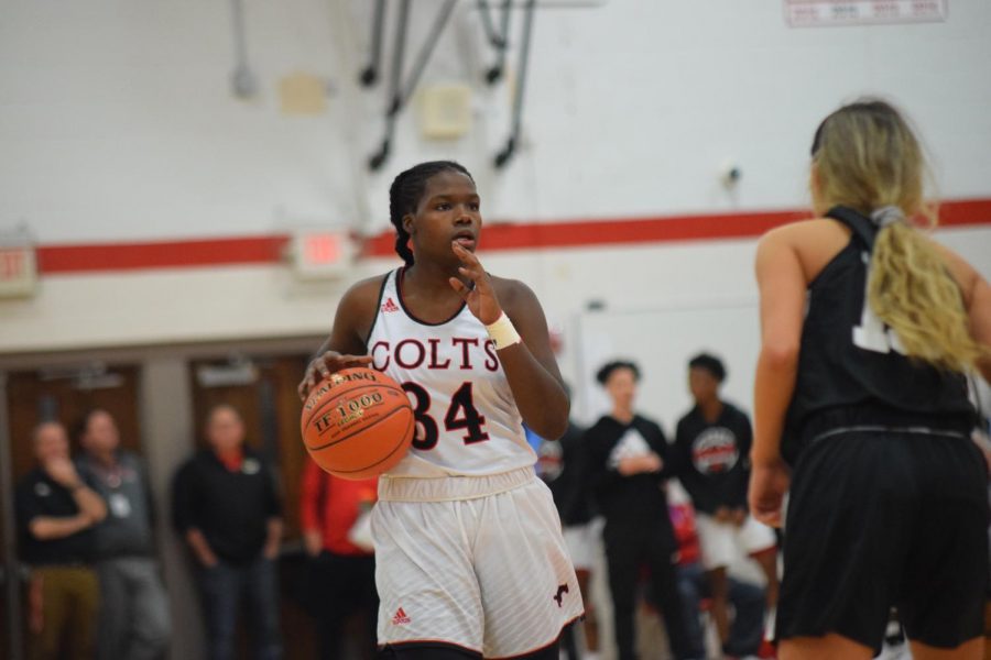 Sophomore+guard+Cynaa+Coleman+dribbles+up+the+court+in+the+game+against+St.+Josephs+in+the+first+round+of+districts+on+Feb.+26%2C+2019+at+Parkway+Central.+The+Colts+beat+the+Angels+56-51.+
