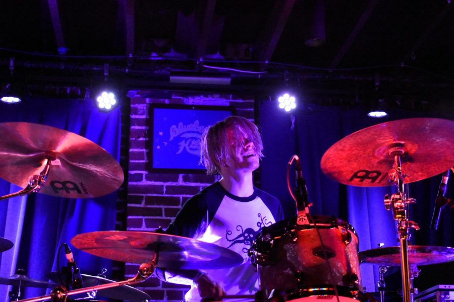 Scuzzs Drummer rocking out at The Duck Room.