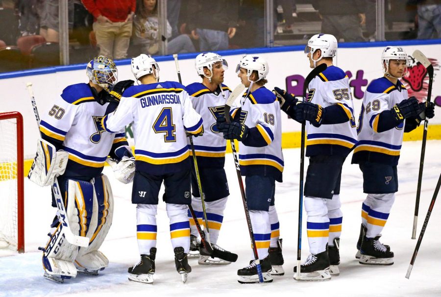 St. Louis Blues players celebrate a 3-2 win against the Florida Panthers at the BB&T Center in Sunrise, Fla., on Tuesday, Feb. 5, 2019. (David Santiago/Miami Herald/TNS)