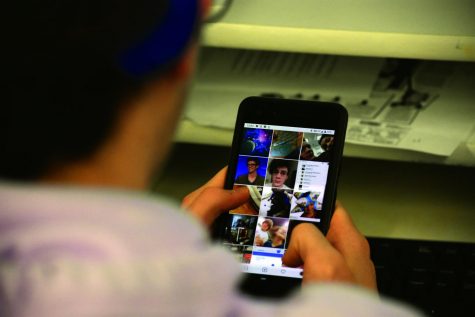 This student is using Instagram, one of the most popular social media applications. While the main purpose is posting and looking at people’s pictures, you can also communicate with people through the app. Photo by Alex Maisenhelder