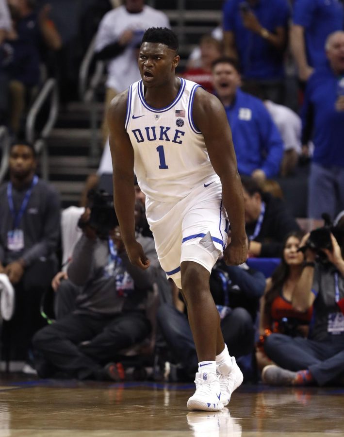 Dukes Zion Williamson (1) celebrates after slamming in two during the first half against Syracuse in the quarterfinals of the ACC Tournament at the Specturm Center in Charlotte, N.C., on Thursday, March 14, 2019. (Ethan Hyman/Raleigh News & Observer/TNS)

