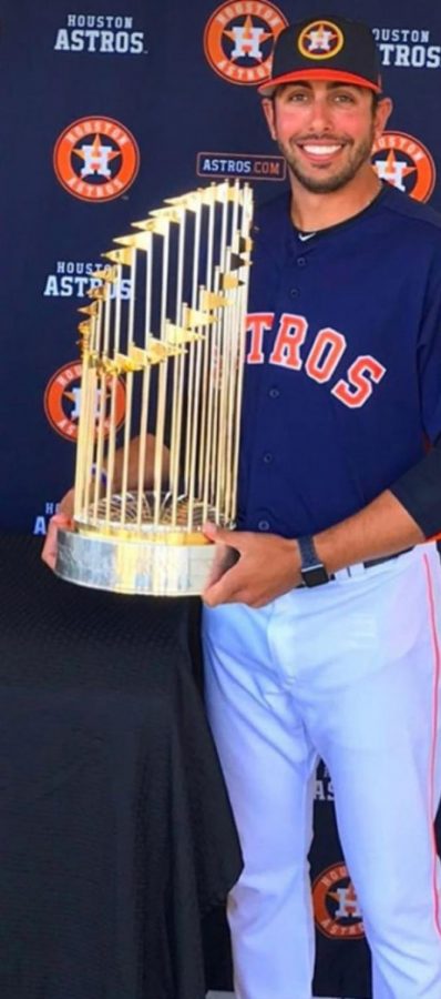 Jason Bell holds the Houston Astros 2017 World Series Trophy. Photo courtesy of Jason Bell.