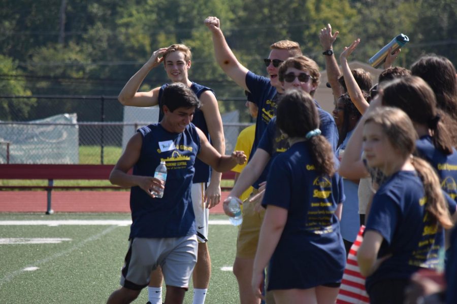 Dan Kelty’s Ac Lab cheers on their team on the soccer fields as they play in the tournament. 