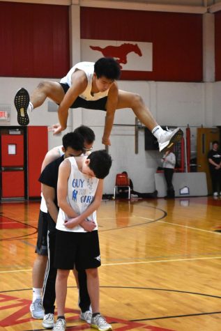 Nick Yn (12) jumps over other Mr. PCH contestants Jacob Stone, Adi Sarangee and Anthony Klein. 