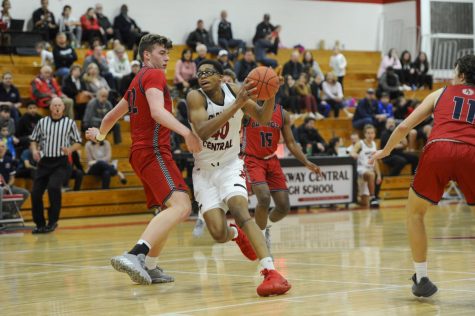 Senior Devion Harris taking the basketball towards the hoop on Dec. 6 at the game against Parkway South.