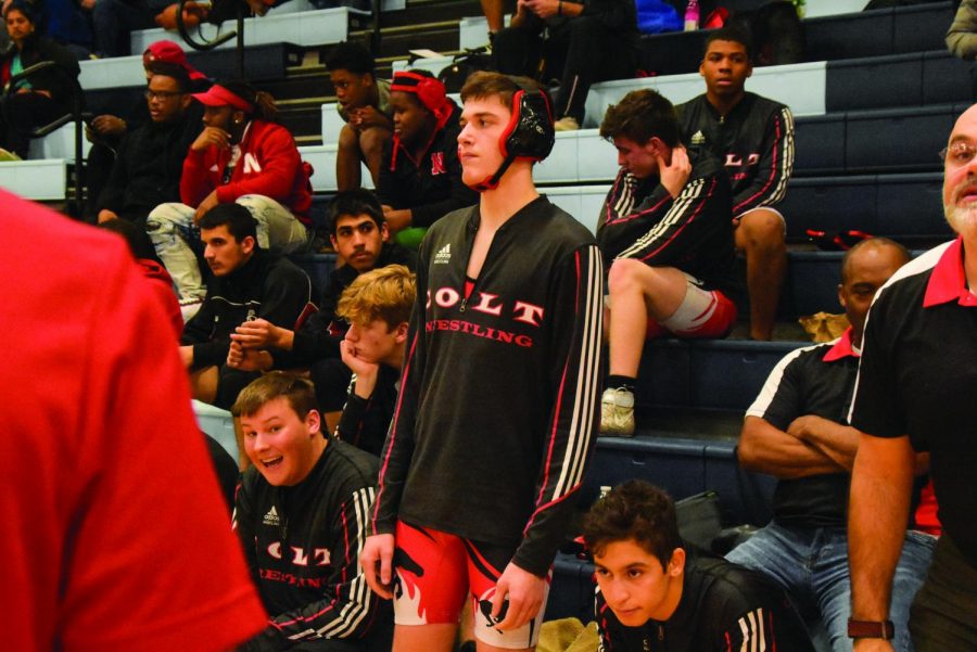 Yousef Ahmed prepares for a match. “I am on track, Liam Hipp is, Joab Hackman is, Yousef Ahmad is, Kalob Duncan is and Hisham Al Ahmad is,” Wheaton said. Duncan wrestled his freshman and sophomore season. Photo by Wagner Portraits.