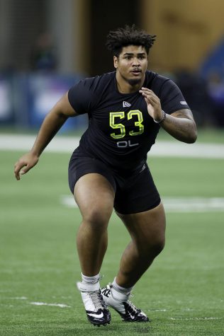 Offensive lineman Tristan Wirfs goes through his NFL draft combine workout. Wirfs was selected 13th overall by the Tampa Bay Buccaneers. 