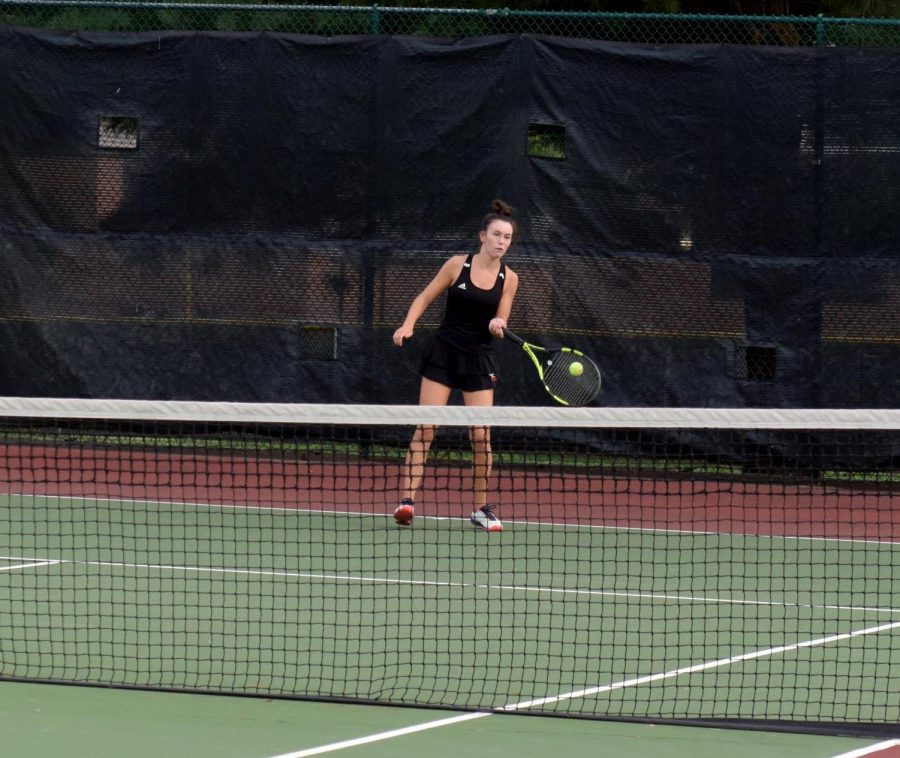 Junior Maggie Huff returning a ball to the other team at the match against Lafayette on Sept. 15. The team won this match.