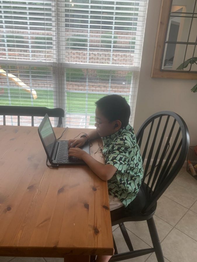 Dexter Wong goes to his fifth grade class at Shenandoah Valley Elementary online. I would really like going back to school, he said. It’s like we all probably took it for granted until it was gone. Photo by Ann Wong.