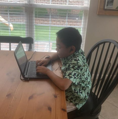 Dexter Wong goes to his fifth grade class at Shenandoah Valley Elementary online.