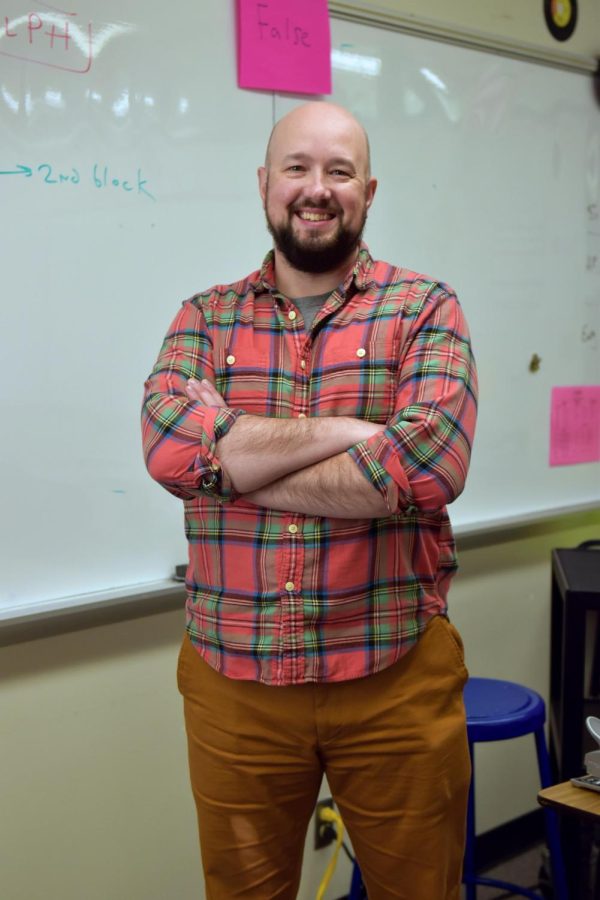 Christian Schaeffer, Teacher of the Year, poses in his classroom. 