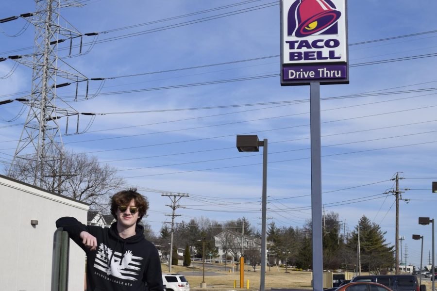 Sam Sailors (10) stands upon Olive BLVD, Taco Bell at approximately 2:41