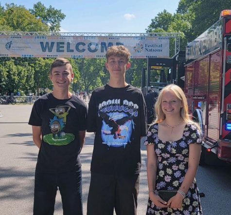 Sophomores Pascal Kunzi, Arne Seifert, and Nila Worm attend the St. Louis Festival of Nations on August 28 with their host families. Photo courtesy of Nila Worm.