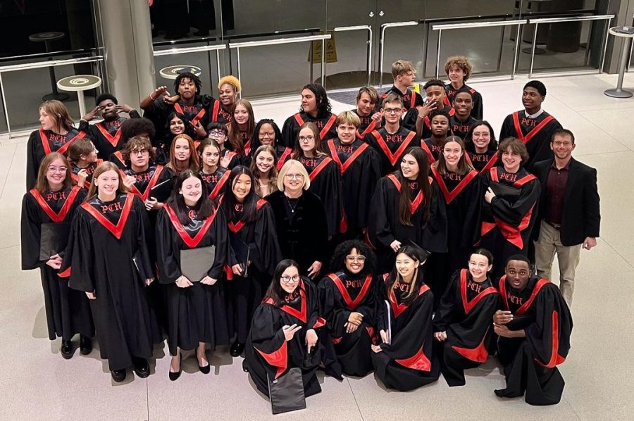The PCH Concert Choir smile for the camera at the concert in Touhill Performing Arts Center in UMSL. 