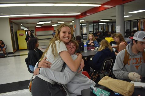 Left: junior Jacob Holthaus and senior Brooke Morley at lunch together having a fun time sitting with friends. 