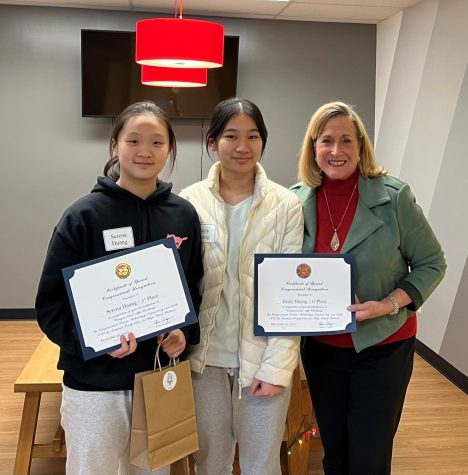 Freshman Serena Huang and senior Emily Huang meet with their representative Ann Wagner from MO 2 district, who congratulates them on their win.