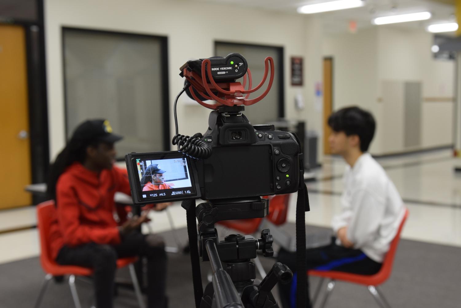 In the social studies commons at Parkway Central, Landon Chen (10) interviews Chance McCline (10) on Feb. 8.  Chen, a reporter for The Corral newspaper, wanted to try something new and create a broadcast package. 