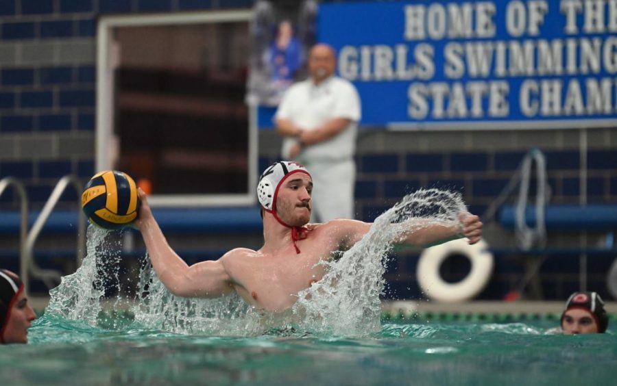 Quin Wolff (12) takes a 5-meter shot, which was a game-changing moment in a water polo game against Kirkwood on April 1 during the Founders Cup tournament at Ladue. The Colts won, 13-5, bringing their record to 10-1.  Wolff scored 2 goals. 