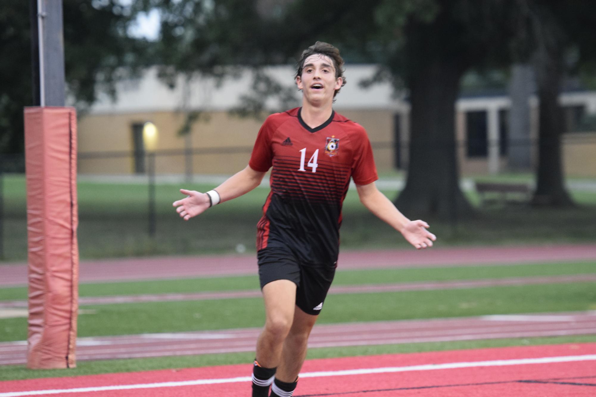 Devin Johnston (9), a center forward, runs across the field after making one of two goals that were made in the game agains Chaminade Wednesday, Sept 6. 