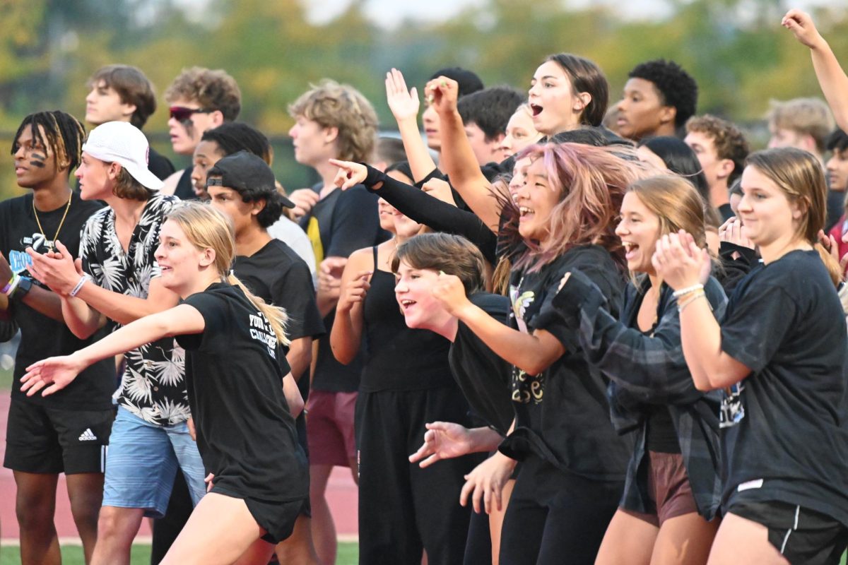 Seniors cheer for their team on the side lines during class games this Wednesday, Sept. 20. Seniors take home the win and bring the school spirit throughout spirit week. Photo by Ethan Albin