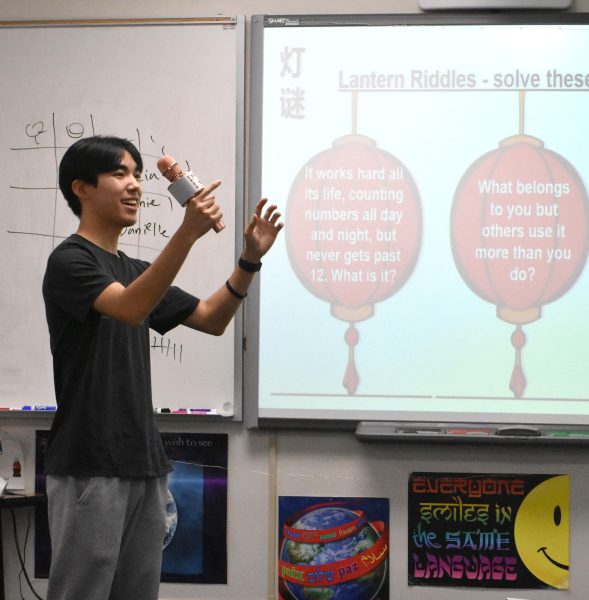 Jeffery Lu (12) presents lantern riddle at mid autumn festival celebration during International Club meeting on Sept. 27. The Mid- Autumn Festival is a celebration to remember family far away. Many celebrate by looking at the moon, which is a symbol of remembrance in Chinese culture. 