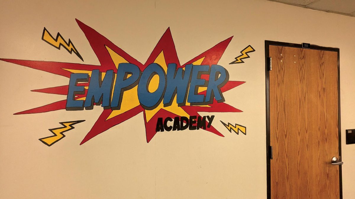 The Empower Academy mural hangs next to the door to the Empower Academy on Sept. 8.  These murals are placed at the entrances to the new academies in PCMS.