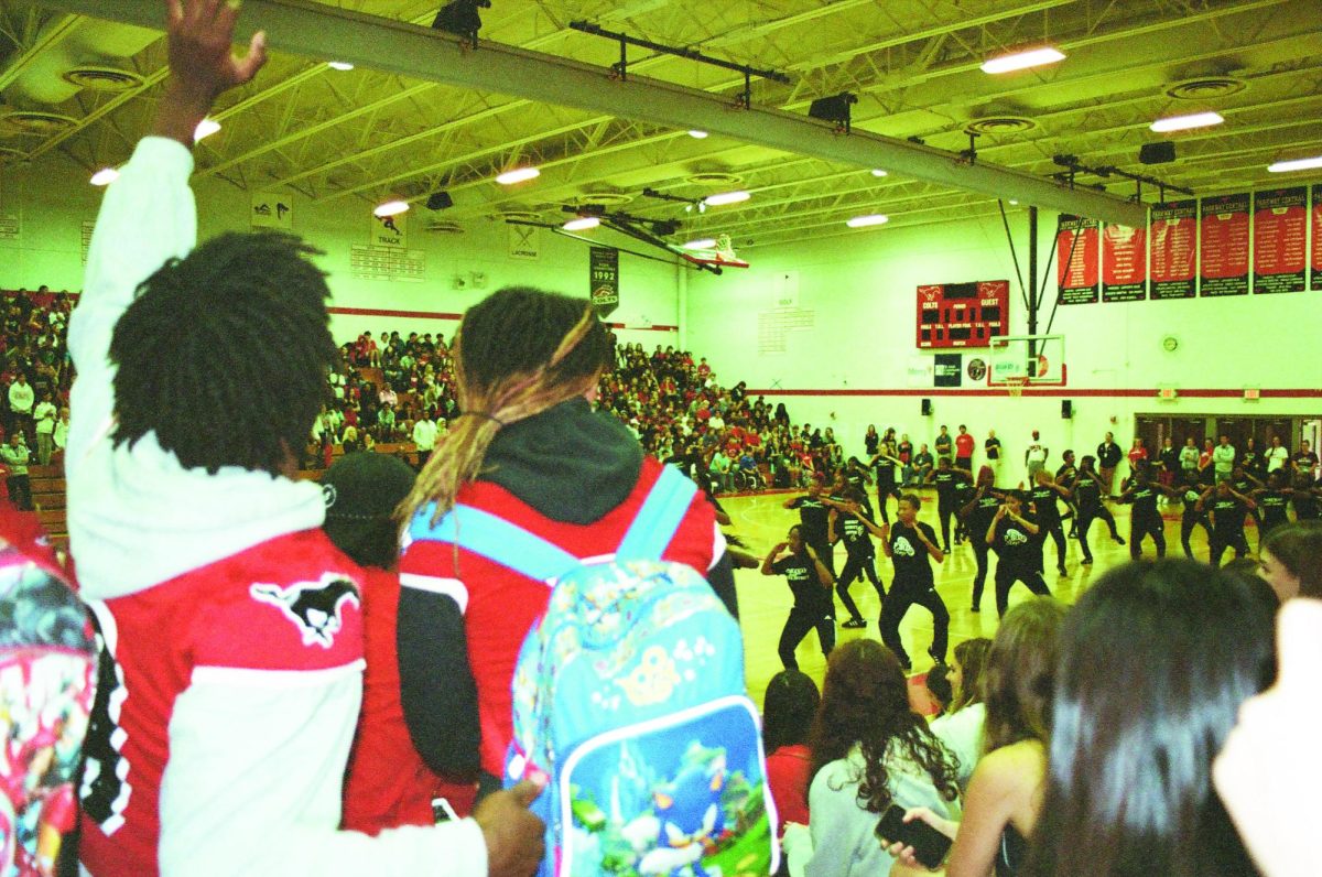 Parkway Central High School students watch the Parkway Step Team perform at the pep rally on Sept. 22. Photo by Gabrielle Williams