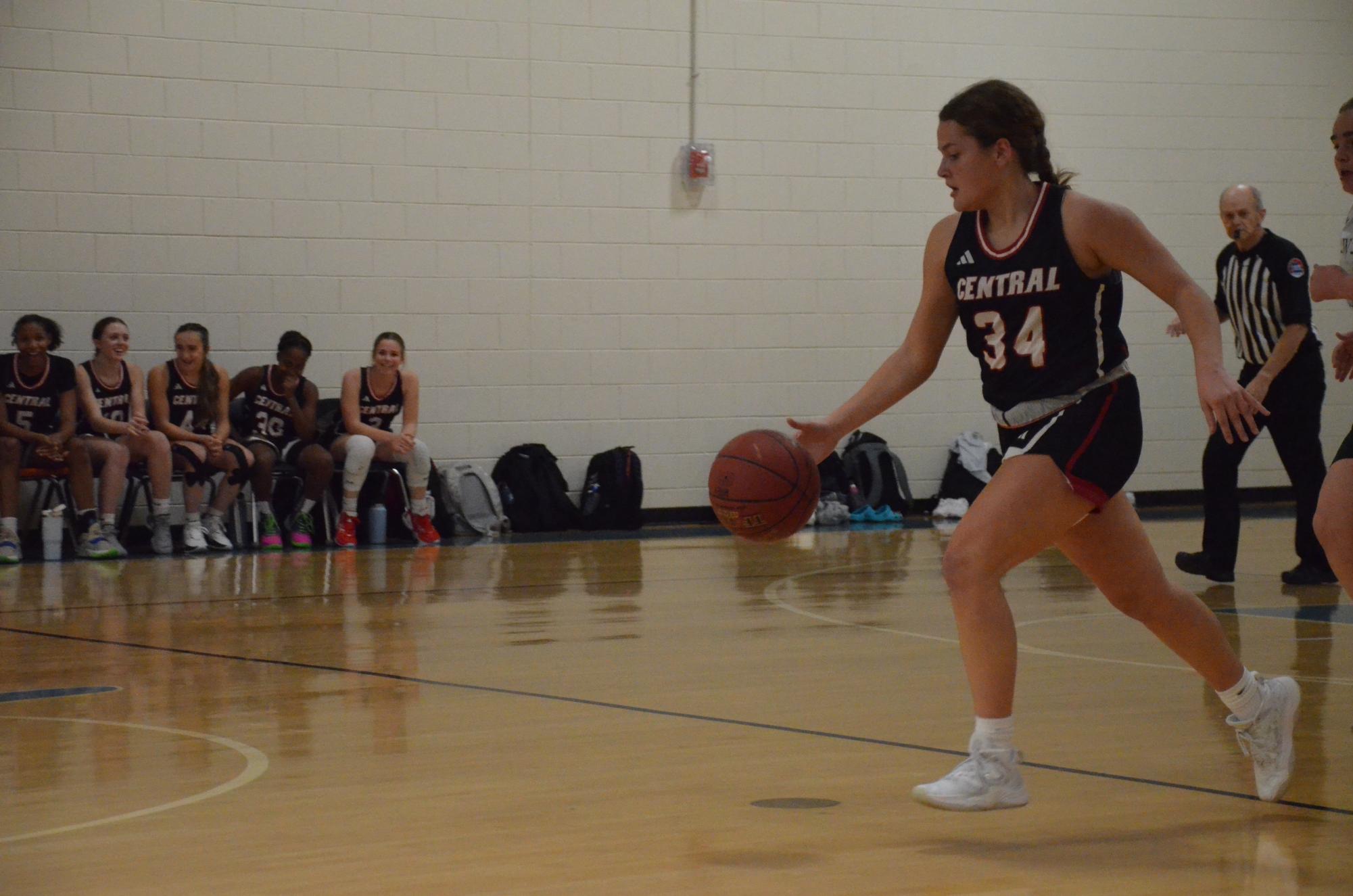 Kaitlyn King (12) dribbles down the court on Nov. 13 against Whitfield. 