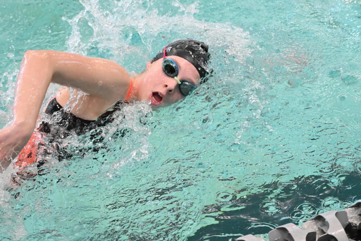  Freshman Madelyn Tucker swims in the state meet on Feb. 15. 