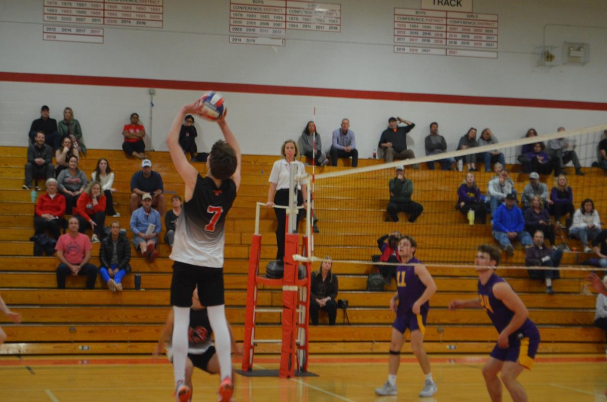 Setter Spencer Duvall goes up for a set in the game against Eureka on March 28.  Duvall leads the team in assists, with 88 as of March 28. 